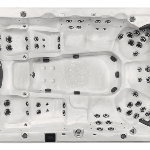 A white spa with black knobs and buttons.