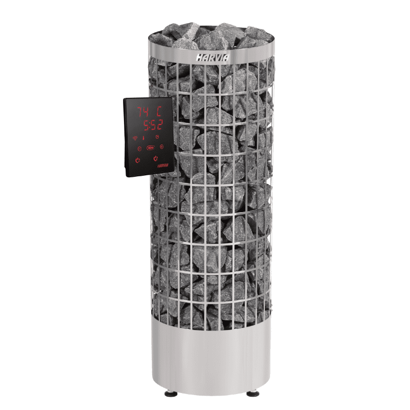 A large metal tower with rocks on top of it.